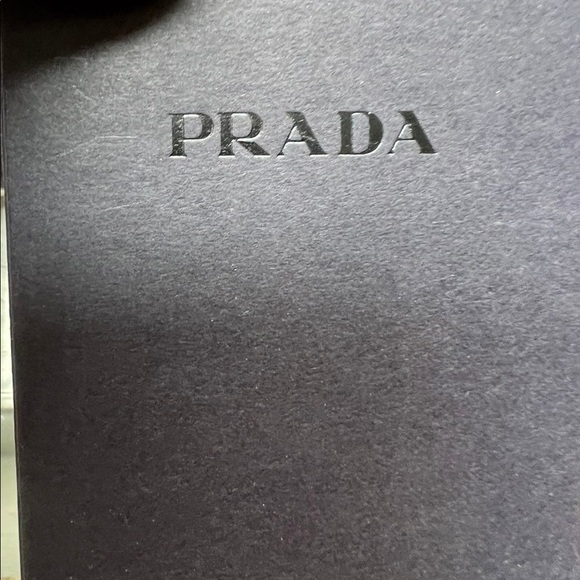 Prada black strappy sandals with cork heal.
